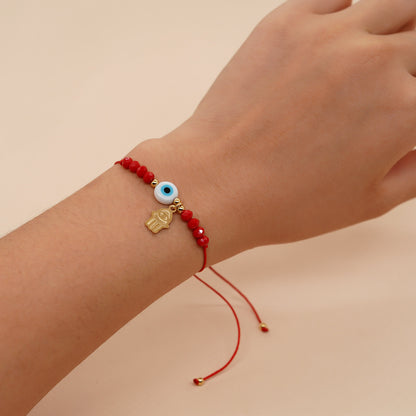 PULSERA ROJA OJO AZUL